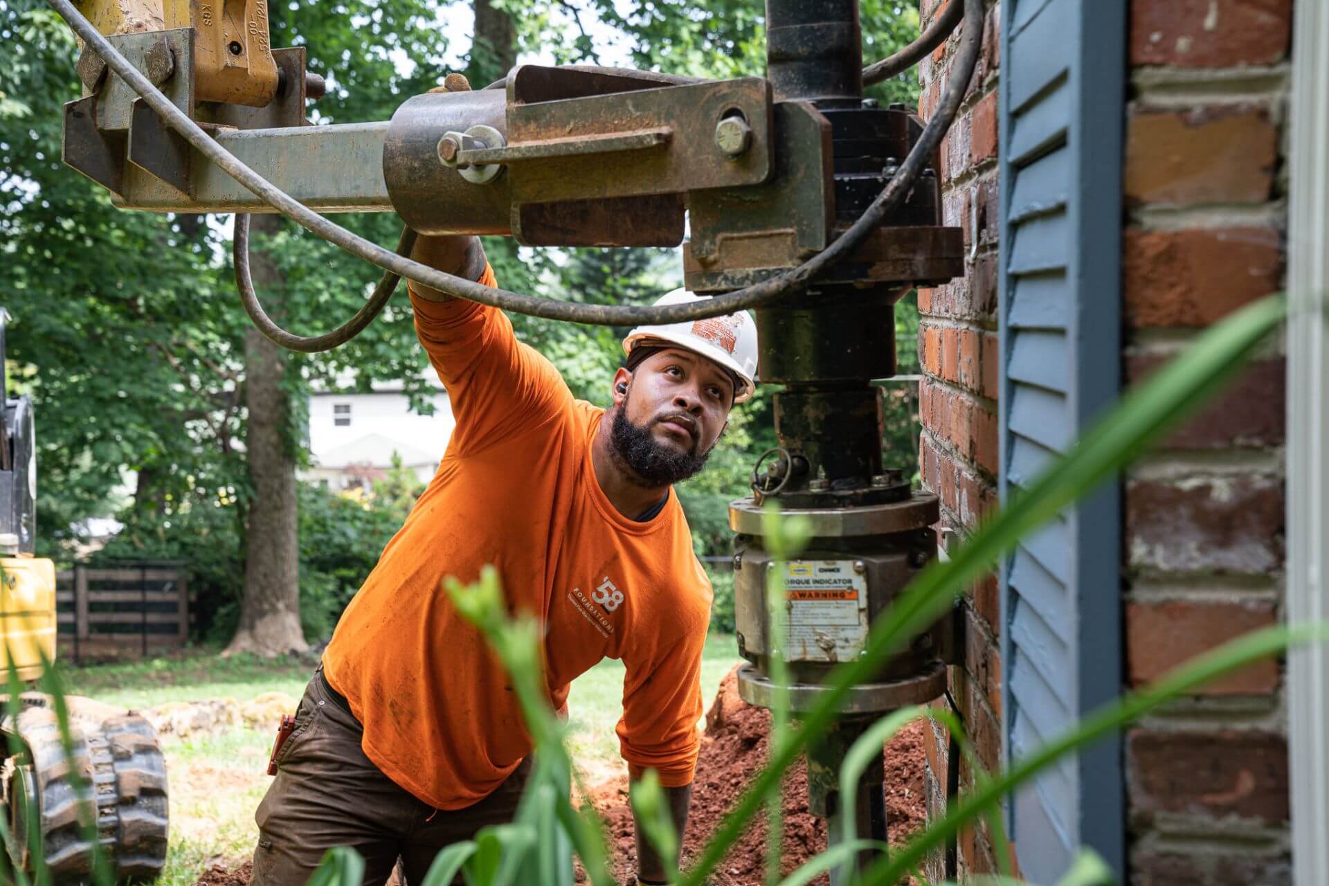 Repairing a settling foundation