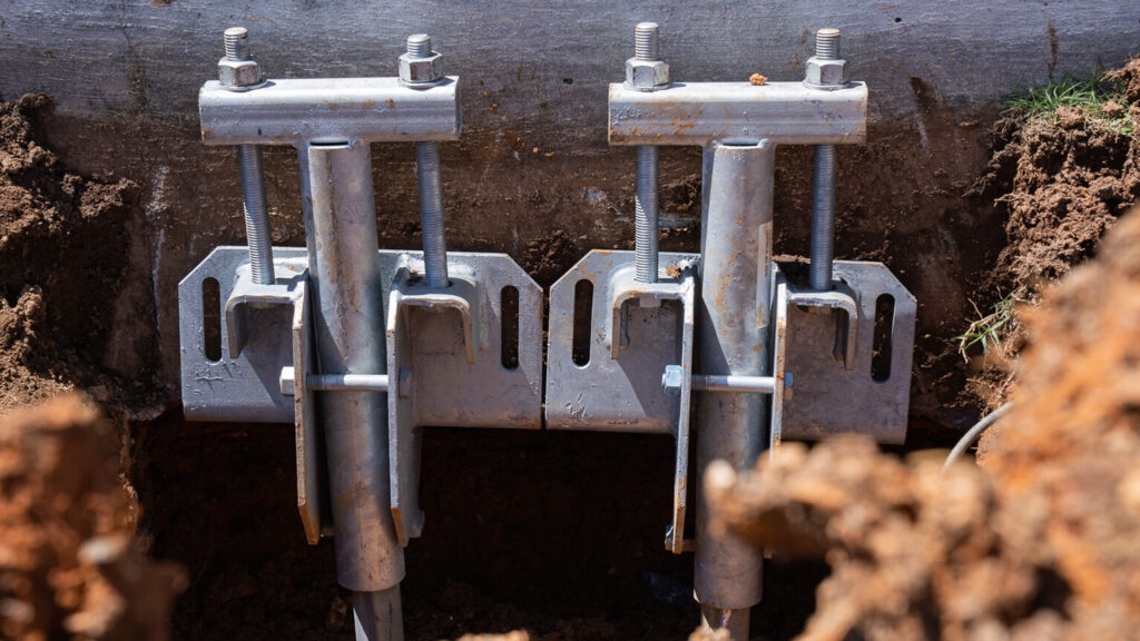 Helical Piers installed for a settling foundation