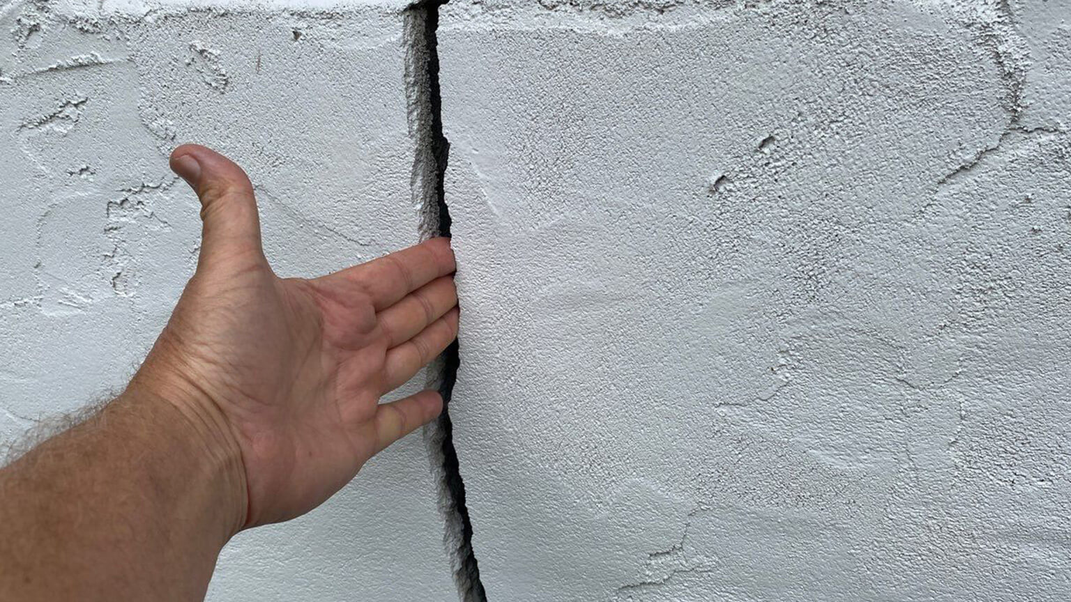 Hand in Foundation Crack
