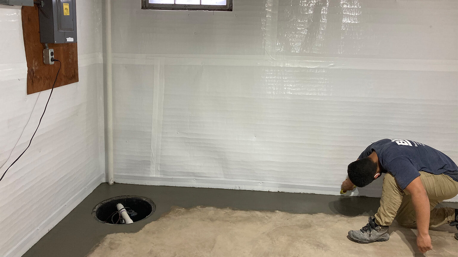 Finishing a basement waterproofing job